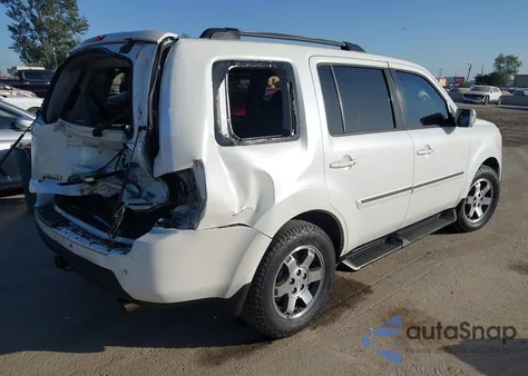 2011 Honda Pilot Touring z USA, uszkodzony, nr VIN 5FNYF4H90BB026338